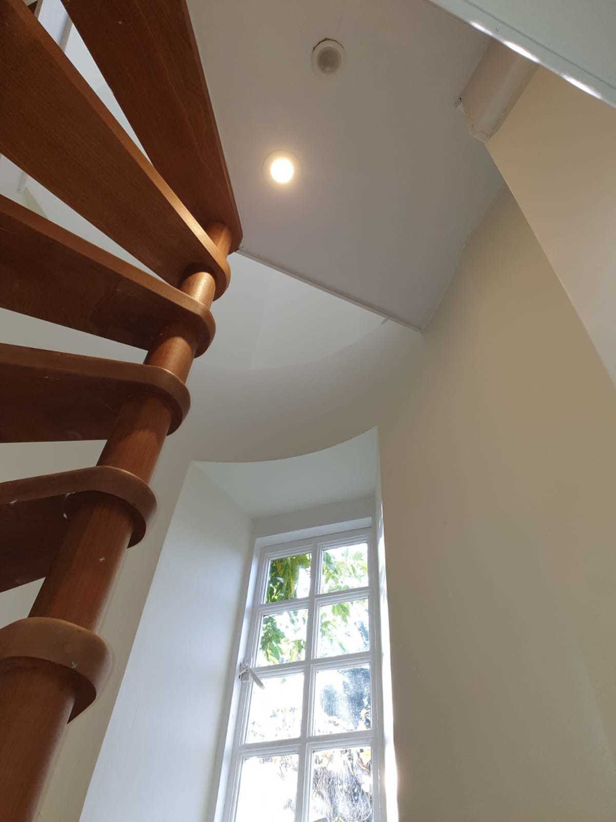 Electrically operated Velux windows with Collingwood downlights either side by Redwood Electrical